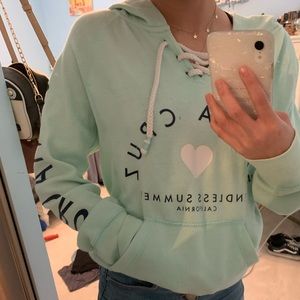 A cute mint green hoodie!
